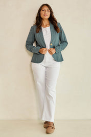 Model Tahnee wearing size 10 of the Cotton Linen Blazer in colour Lagoon (Green), from the front, showing the whole outfit