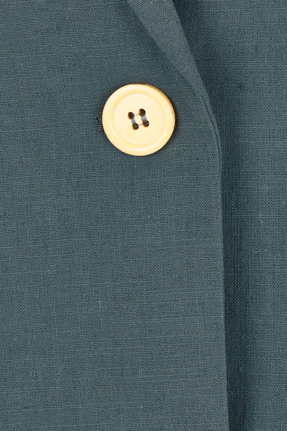 Product shot of the Cotton Linen Blazer in colour Lagoon (Green), detail