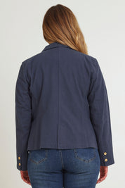 Model Chanel wearing size 16 of the Cotton Linen Blazer in colour Navy (Blue), from the back