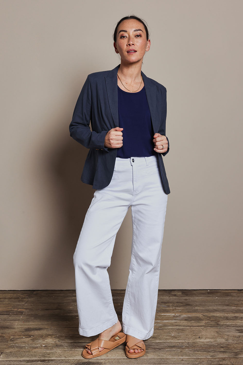 Model Katie wearing size 8 of the Cotton Linen Blazer in colour Navy (Blue), from the front, showing the whole outfit