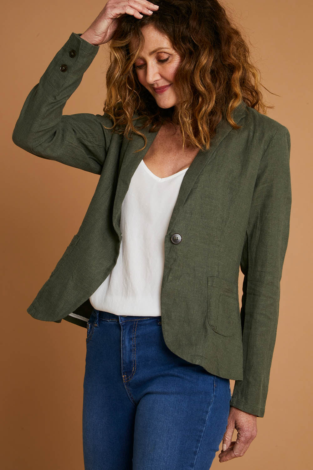Model Emma wearing size 10 of the Cotton Linen Blazer in colour Olive (Green), from the front, showing the whole outfit