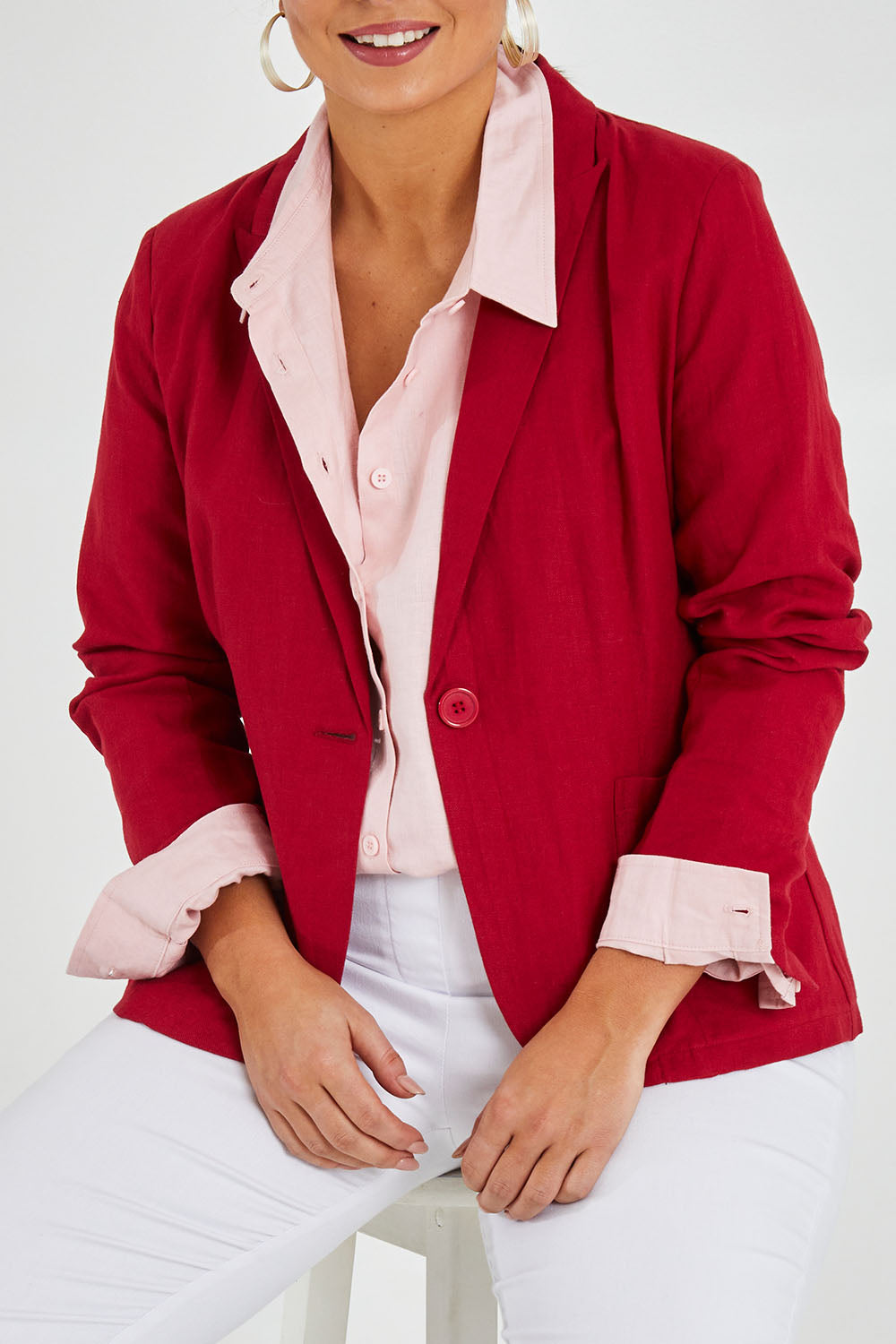Model Monique wearing size 14 of the Cotton Linen Blazer in colour Red (Red), from the front, cropped image