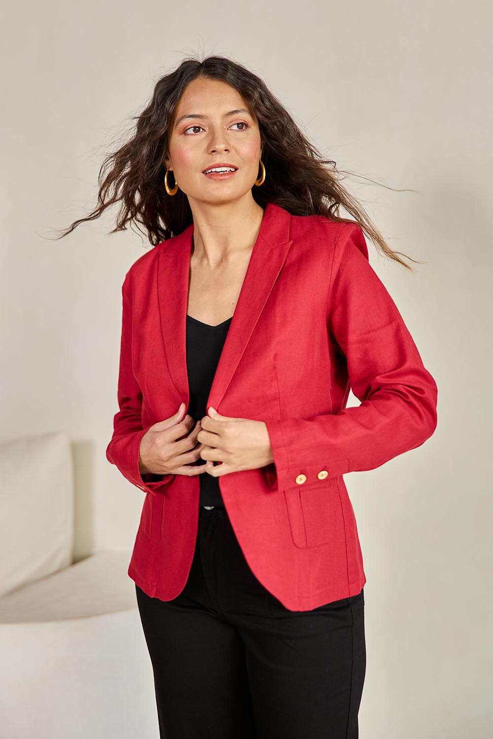Model Tahneei wearing size 10 of the Cotton Linen Blazer – Red in colour Red, in a cropped view