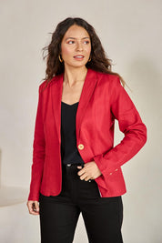 Model Tahneei wearing size 10 of the Cotton Linen Blazer – Red in colour Red, in a cropped view