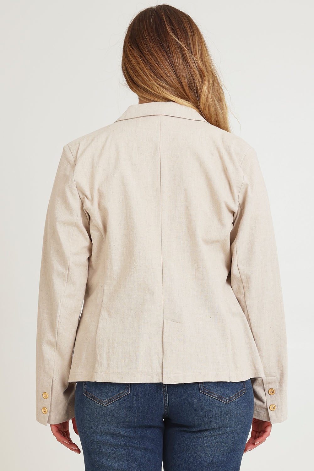 Model Chanel wearing size 16 of the Cotton Linen Blazer in colour Sand, from the back
