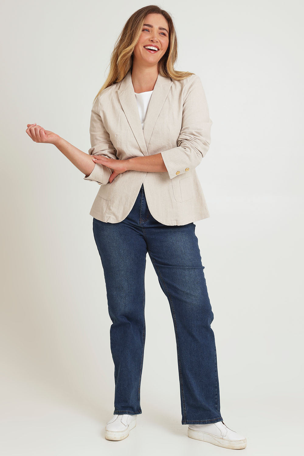 Model Chanel wearing size 16 of the Cotton Linen Blazer in colour Sand, from the front, showing the whole outfit