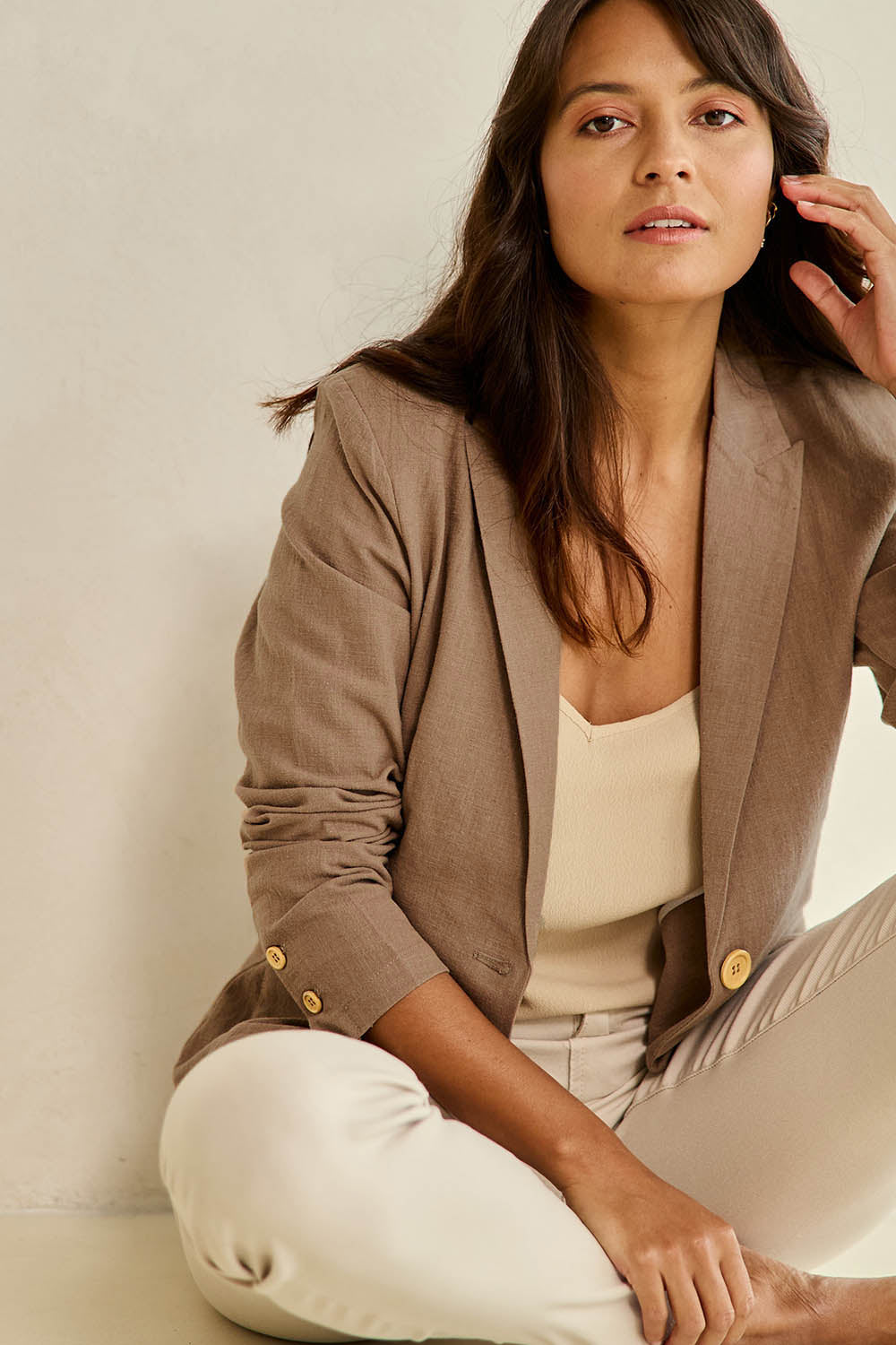 Model Tahnee wearing size 10 of the Cotton Linen Blazer in colour Tan, from the front, showing the whole outfit