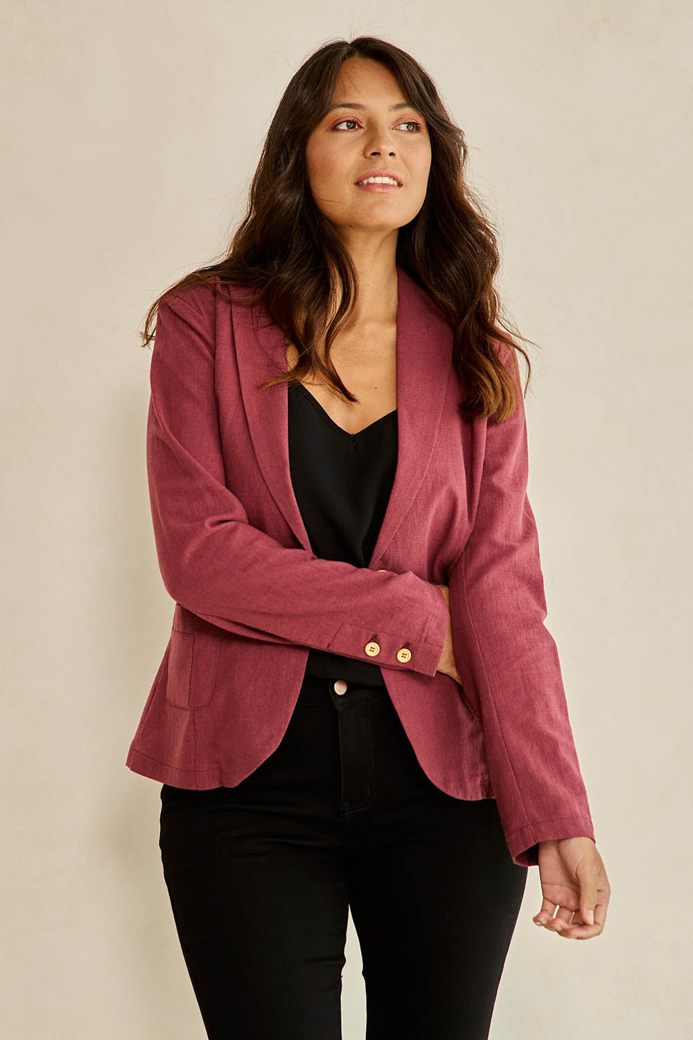 Model Tahnee wearing size 10 of the Cotton Linen Blazer in colour Wine (Red), from the front, cropped image