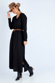 Model Laura wearing size 14 of the Cotton Stretch Maxi Dress in colour Moonless (Black), from the front, showing the whole outfit
