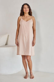 Model Tahneei wearing size 10 of the Cotton Slip - Sand in colour Sand, from the front