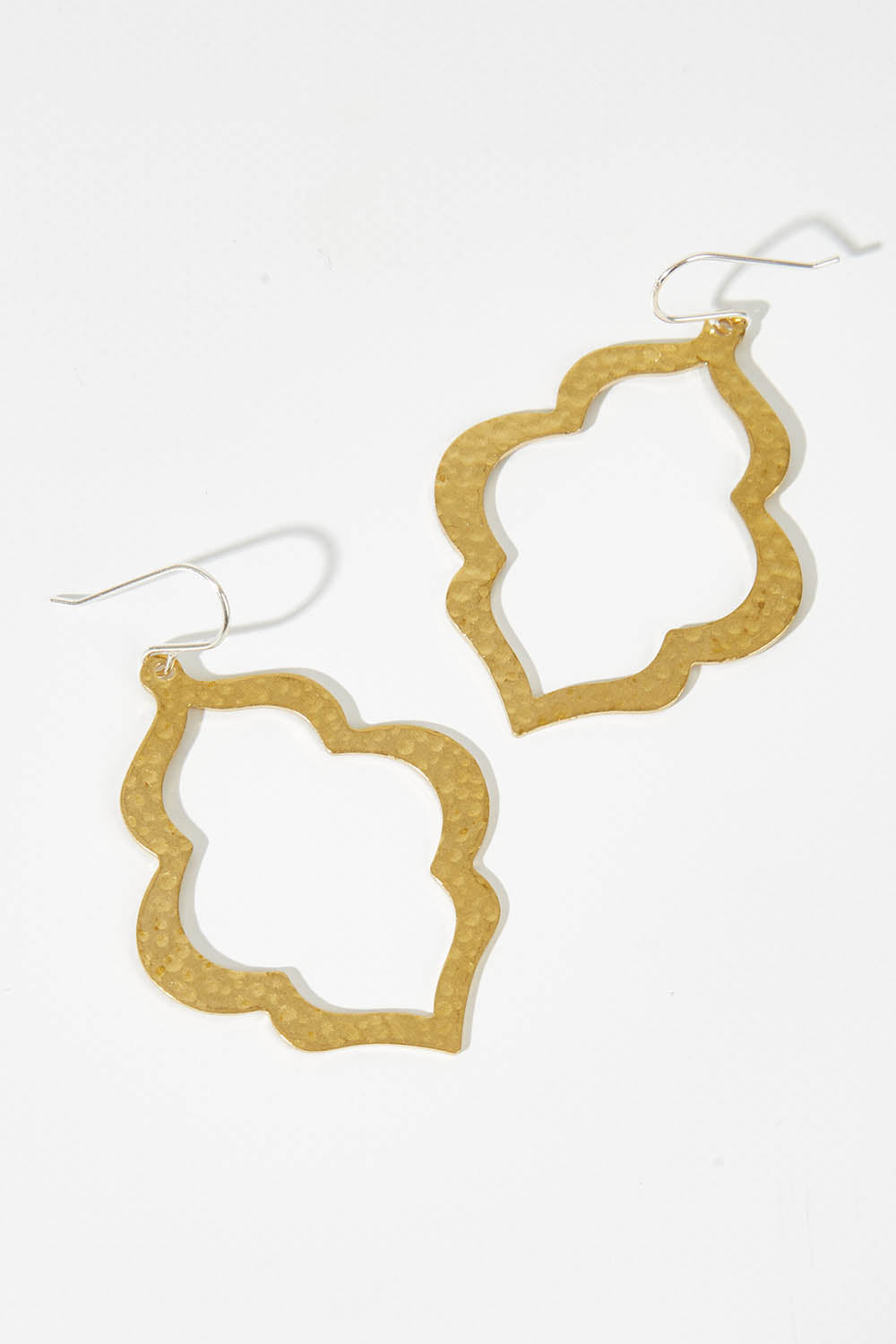 A model wearing size OneSize of the Ali Raw Brass Drop Earring in colour Rawbrass (Metallics), from the front, showing the whole outfit