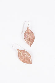 A model wearing size OneSize of the Phoebe Filigree Earring in colour Rosegold (Metallics), from the front, showing the whole outfit