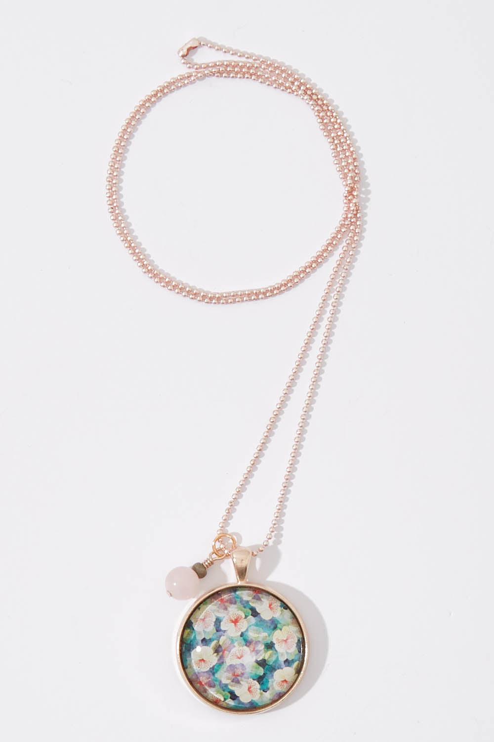 A model wearing size OneSize of the Secret Garden Pendant With Rose Quartz Necklace in colour Metallic (Metallics), from the front, showing the whole outfit