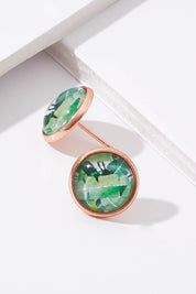 A model wearing size OneSize of the Daintree Stud Earrings in colour Metallic (Metallics), from the front, showing the whole outfit