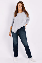 Model Jessica wearing the Pull On Marilyn Straight in colour Harmony (Blue), from the front, showing the whole outfit
