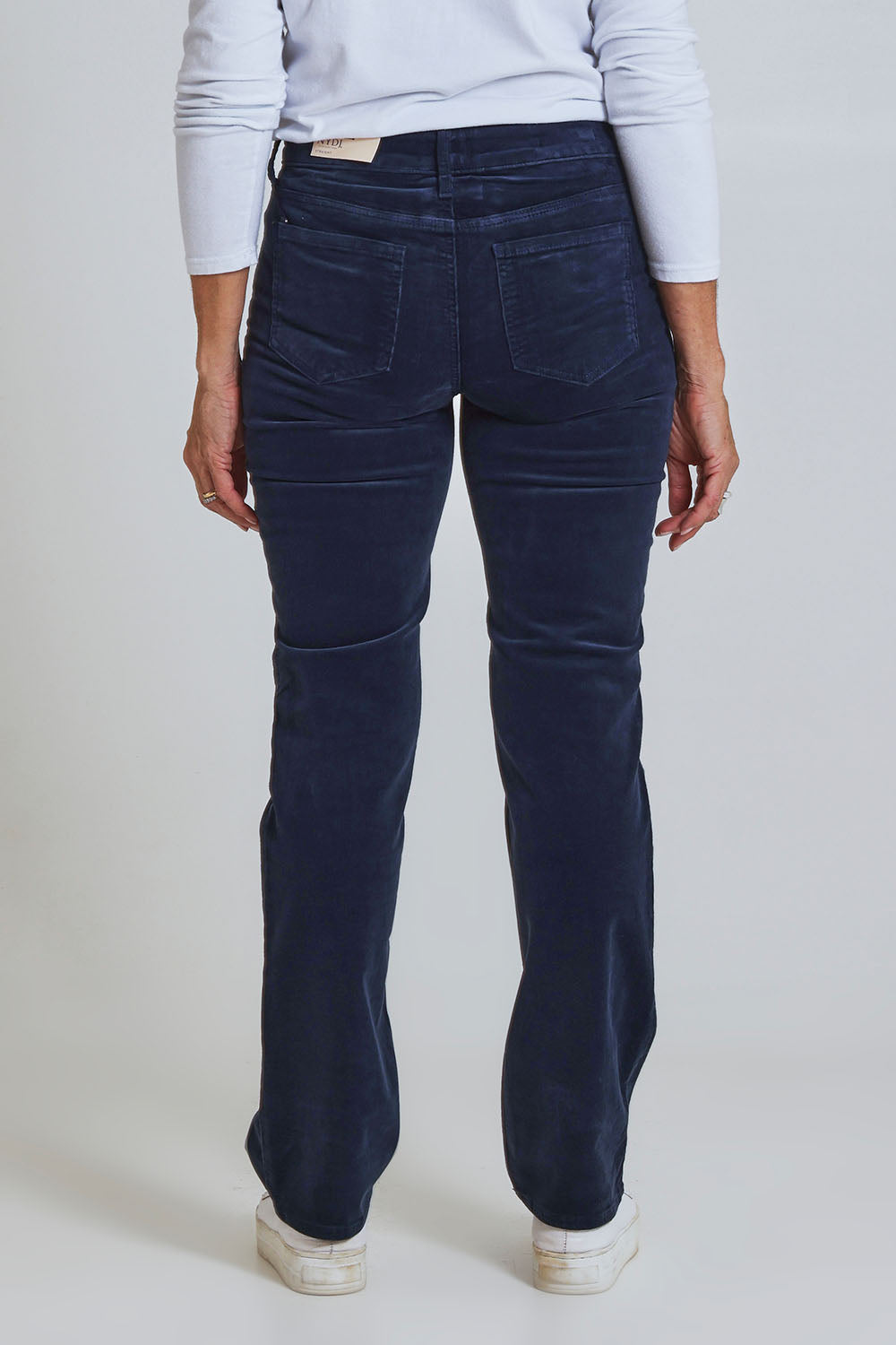 Model Sandy wearing the Marilyn Straight Jean in colour Starless (Blue), from the back