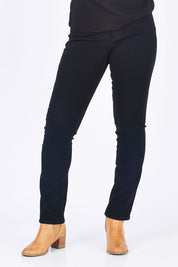 Model Summer wearing the Sheri Slim in colour Black (Black), from the front, cropped image