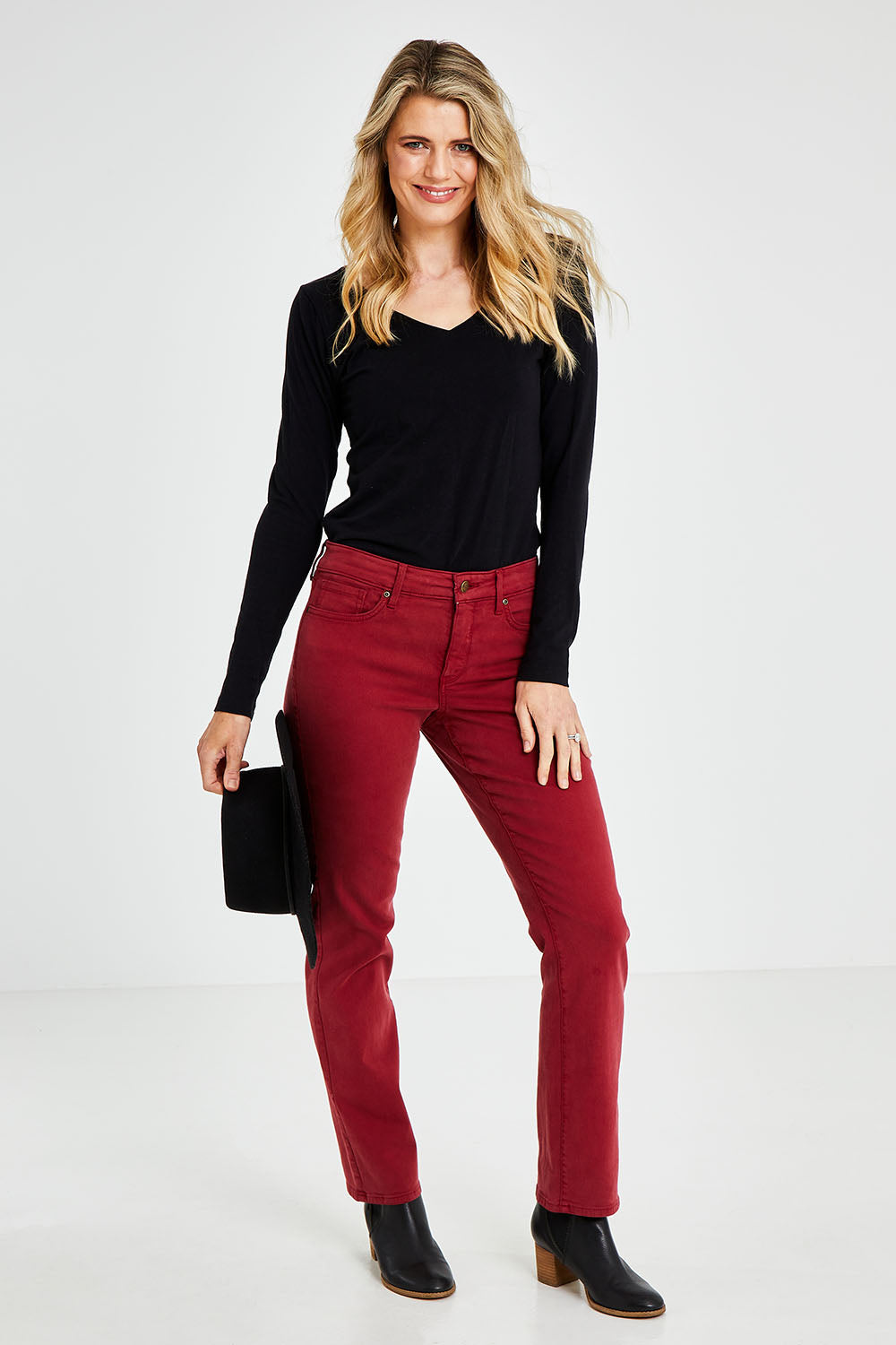 Model Kelly wearing the Marilyn Straight in colour Boysnberry (Red), from the front, showing the whole outfit