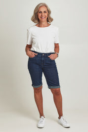 Model Sandy wearing the Briella Short in colour Goldcoast (Blue), from the front, showing the whole outfit