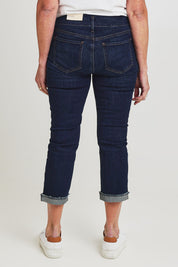 Model Sandy wearing the Chloe Capri Jean in colour Northbridg (Blue), from the back