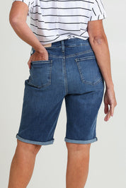 Model Sandy wearing the Briella Short in colour Valencia (Blue), from the back