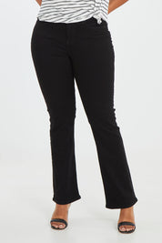Model Noli wearing the Barbara Bootcut Jean in colour Black (Black), from the front, cropped image