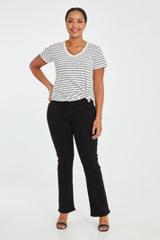 Model Noli wearing the Barbara Bootcut Jean in colour Black (Black), from the front, showing the whole outfit