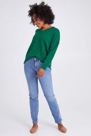 Model Olivia wearing the Marilyn Straight Jean in colour Haley (Blue), from the front, showing the whole outfit