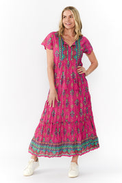 Model Genericm wearing size sample of the Zola Cotton Maxi Dress - Fuchsia in colour Fuchsia, from the front