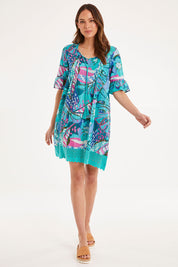 Model Madeline wearing size 10 of the Hannah Short Sleeve Boho Dress in colour Print1 (Blue), from the front, showing the whole outfit