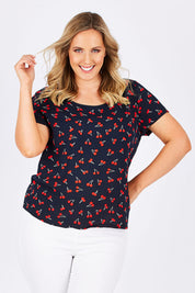 Model Jess wearing the First Mix Top in colour Cherry (Black), from the front, cropped image