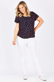 Model Jess wearing the First Mix Top in colour Cherry (Black), from the front, showing the whole outfit