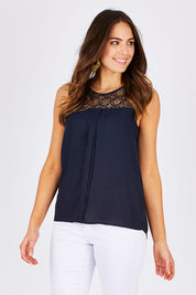 Model Madeline wearing the Venice Lace Top in colour NightSky (Blue), from the front, cropped image
