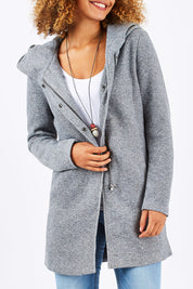 Model Summer wearing the Sedona Light Coat in colour LightGrey (Grey), from the front, cropped image