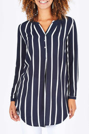 Model Summer wearing size S of the Aida Long Tunic Shirt in colour AidaStripe (Black), from the front, cropped image