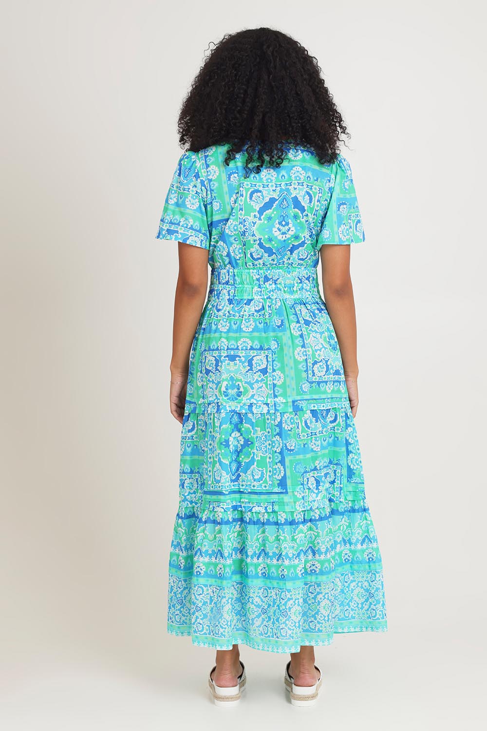 Model Ziara wearing size 10 of the Short Sleeve Cotton Midi Dress in colour Aqua (Blue), from the back