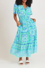 Model Ziara wearing size 10 of the Short Sleeve Cotton Midi Dress in colour Aqua (Blue), from the front, cropped image