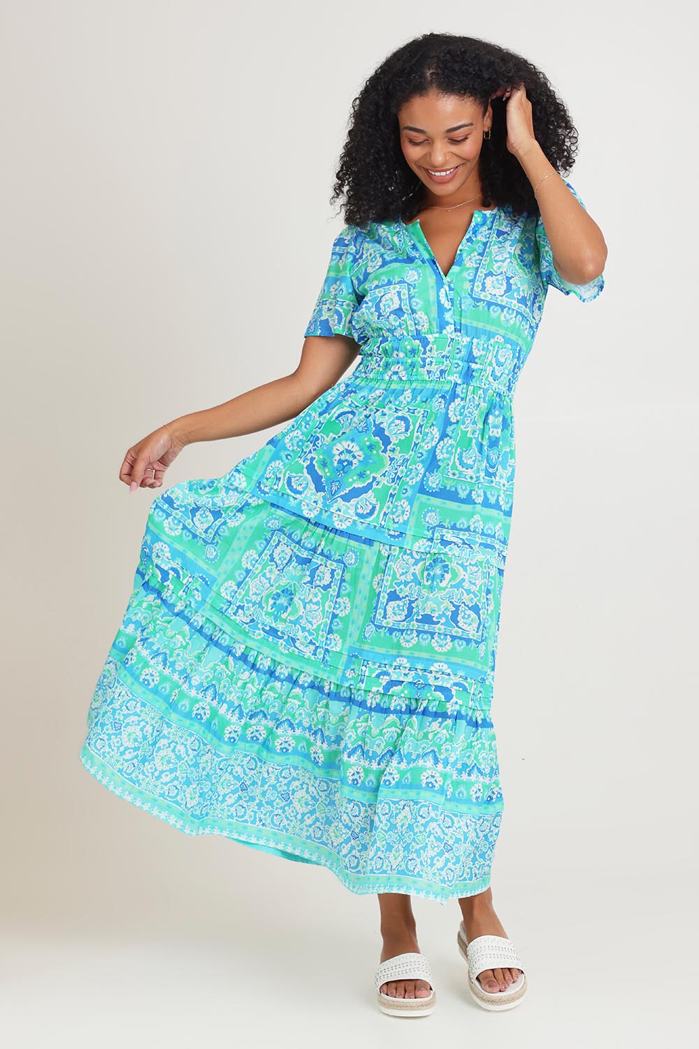 Model Ziara wearing size 10 of the Short Sleeve Cotton Midi Dress in colour Aqua (Blue), from the front, showing the whole outfit