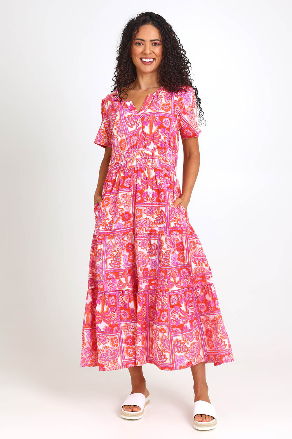 Model Pamelar wearing size 10 of the Short Sleeve Maxi Dress – Pink in colour Pink, from the front