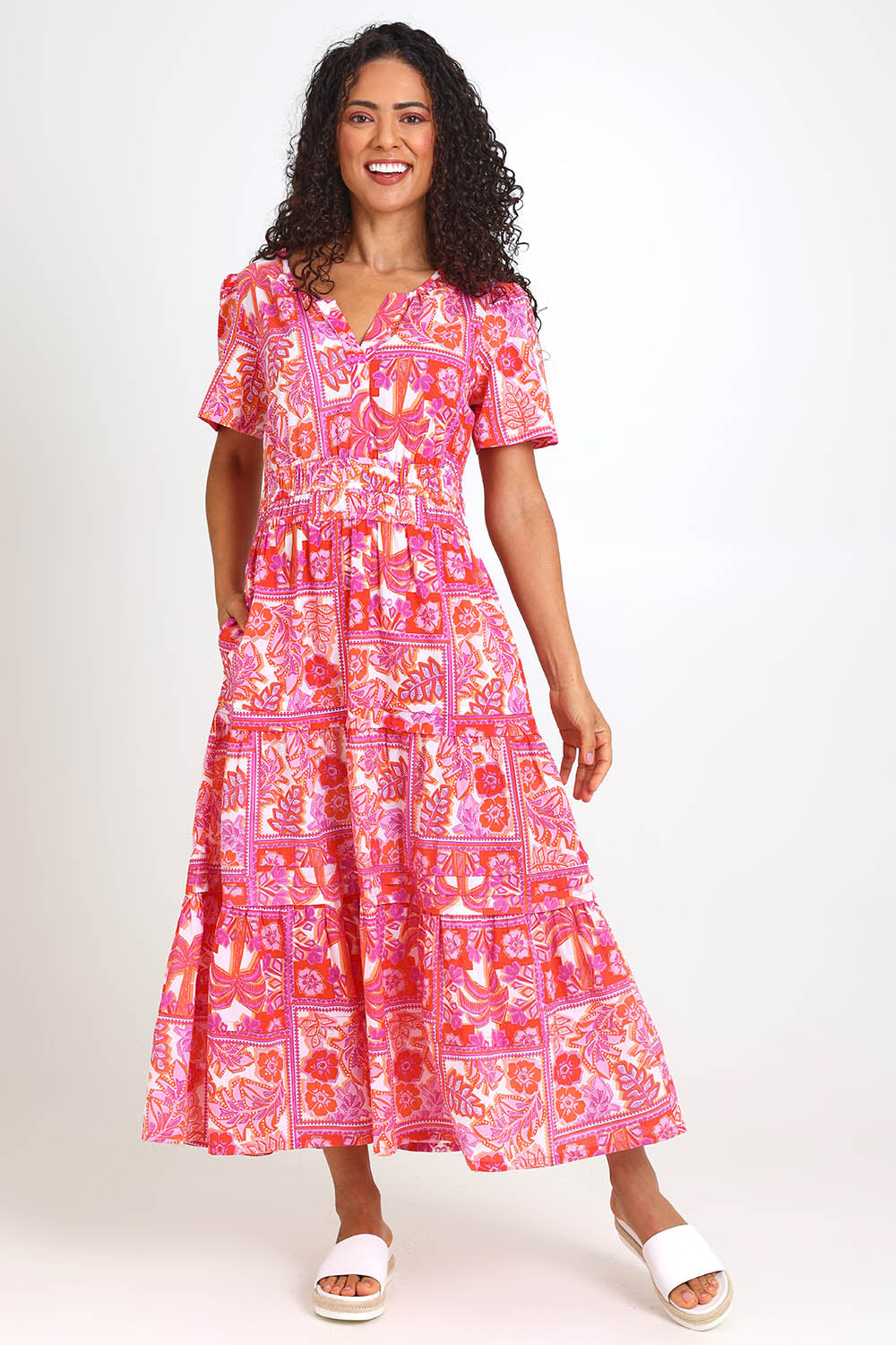 Model Pamelar wearing size 10 of the Short Sleeve Maxi Dress – Pink in colour Pink, from the front