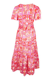 Product shot of the Short Sleeve Maxi Dress – Pink in colour Pink, from the back