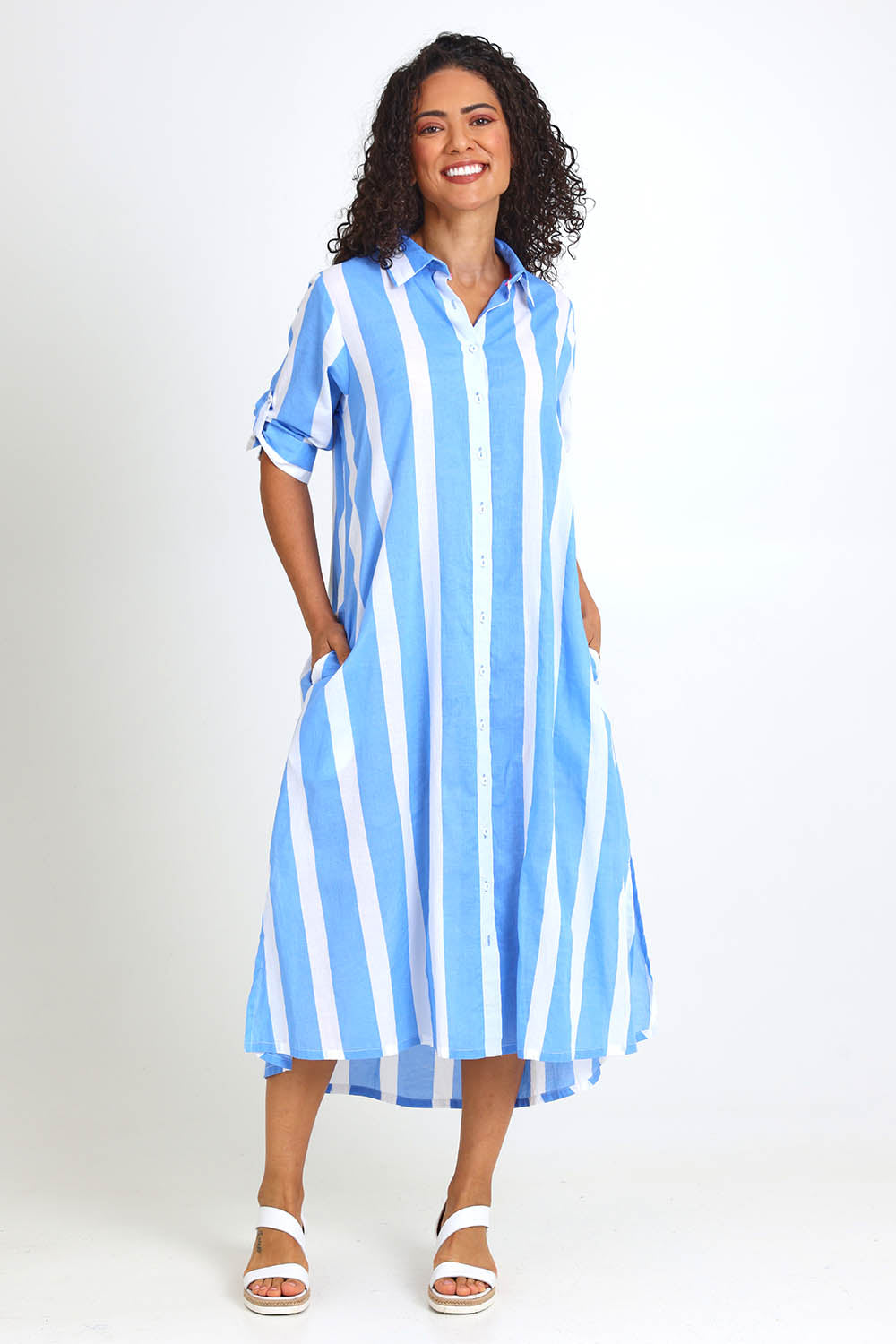 Model Pamelar wearing size 10 of the Long Buttonthrough Dress – Blue in colour Blue, from the front