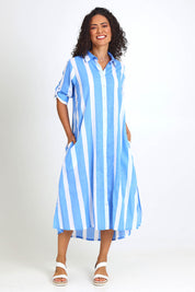 Model Pamelar wearing size 10 of the Long Buttonthrough Dress – Blue in colour Blue, from the front