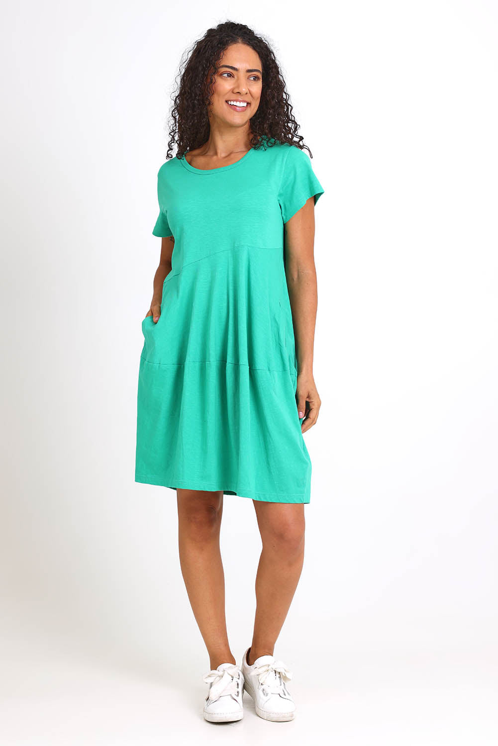 Model Pamelar wearing size 10 of the Essentials Bubble Cotton Knit Dress - Green in colour Green, from the front