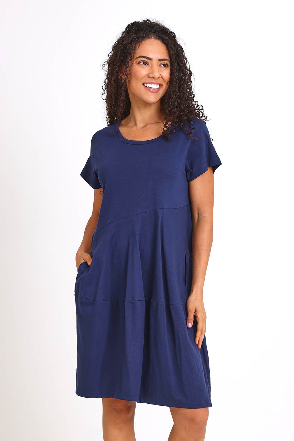 Model Pamelar wearing size 10 of the Essentials Bubble Cotton Knit Dress - Navy in colour Navy, from the front