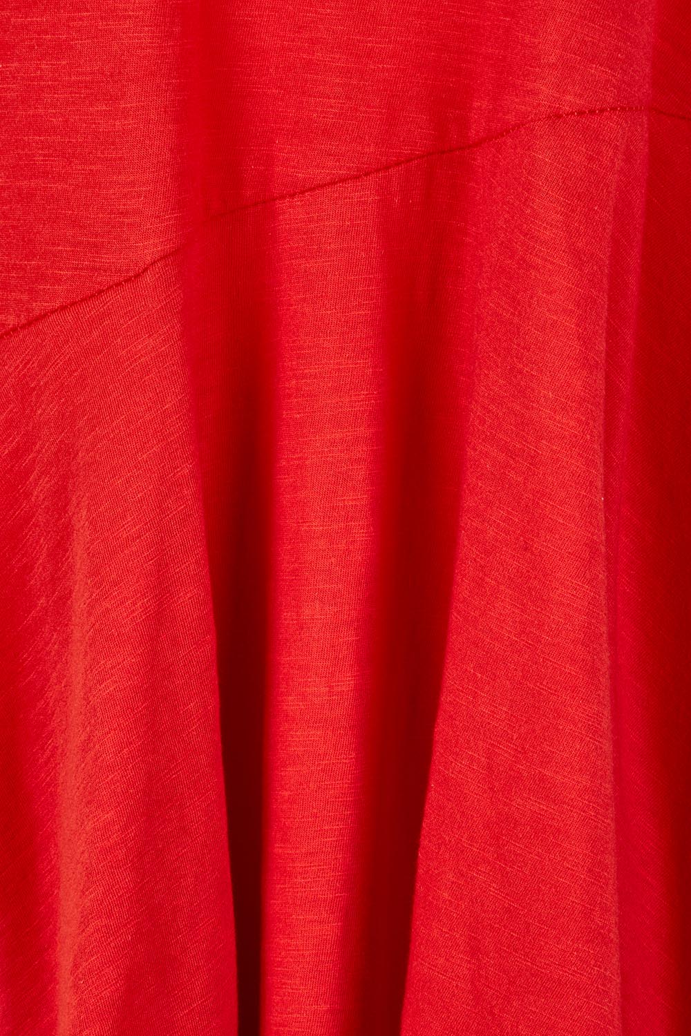 Product shot of the Essentials Organic Cotton Bubble Dress in colour Red (Red), detail