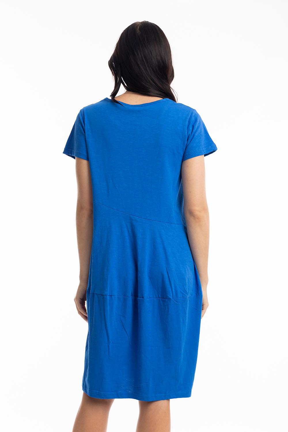 A model wearing the Essentials Knit Bubble Dress in colour Electricbl (Blue), from the back