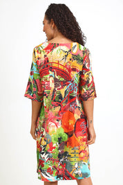 Model Pamelar wearing size 10 of the Patch Bubble Dress – Print in colour Print, from the back