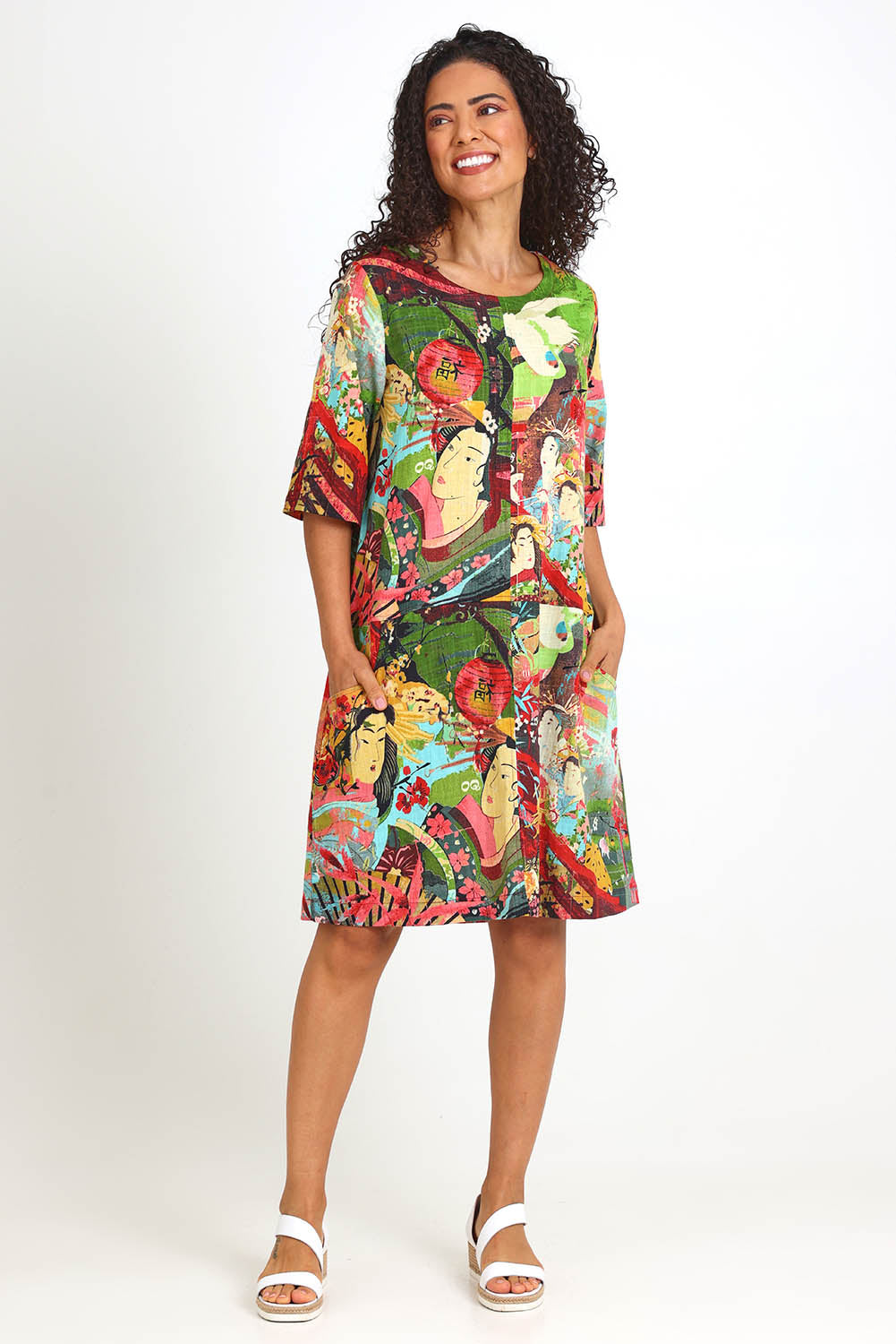 Model Pamelar wearing size 10 of the Patch Bubble Dress – Print in colour Print, from the front