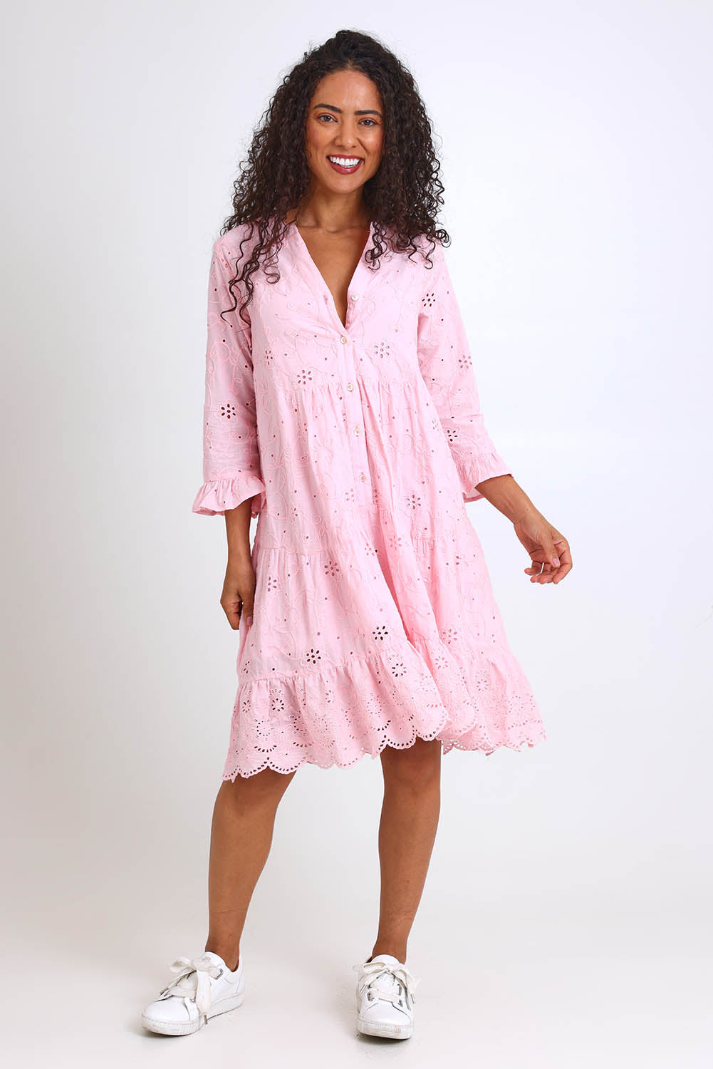 Model Pamelar wearing size 10 of the Essentials Broderie Frill Hem and Sleeves Dress - Pink in colour Pink, from the front